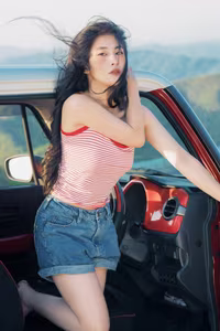 VGU No.128: Summer vibes: Young woman relaxed on a red car, captivating free spirit-4