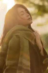 Discover the Serene Natural Beauty of an Asian Girl in a Warm Golden Hour Portrait 1047274-7