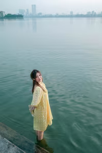 VGU No.135: Capturing Youthful Radiance: Girl in Yellow Dress Finds Serenity by the Lakeside.-1