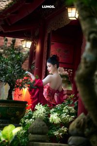 Traditional Vietnamese Beauty: Elegant Woman with Red Lantern, Capturing Asian Charm. 1000018929.jpg-8