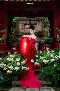 Traditional Vietnamese Beauty: Elegant Woman with Red Lantern, Capturing Asian Charm. 1000018929.jpg-13