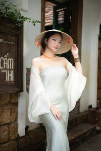 Graceful Vietnamese Girl in Traditional Conical Hat-4
