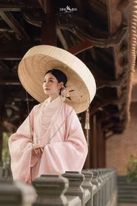 XVG No.50: Elegant Vietnamese Woman in Pink Traditional Dress, Conical Hat, Serene Beauty.-8