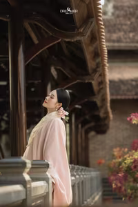 XVG No.50: Elegant Vietnamese Woman in Pink Traditional Dress, Conical Hat, Serene Beauty.-2