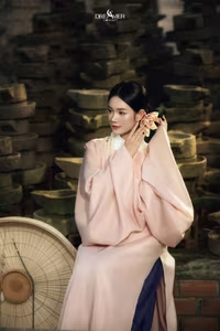 XVG No.50: Elegant Vietnamese Woman in Pink Traditional Dress, Conical Hat, Serene Beauty.-3