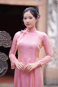 VGU No.136: The Graceful Pink Ao Dai: Vietnamese Beauty Embracing Tradition and Serenity-10