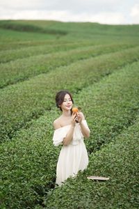 Serene Girl Embracing Nature & Book in Lush Green Tea Hill-5