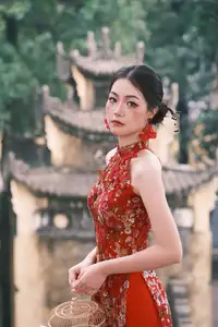 Graceful Asian Woman in Vibrant Red Floral Dress: Timeless Elegance by the Ancient Tree 1000024556-1