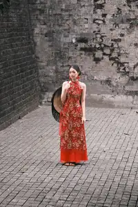 Graceful Asian Woman in Vibrant Red Floral Dress: Timeless Elegance by the Ancient Tree 1000024556-2