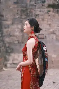 Graceful Asian Woman in Vibrant Red Floral Dress: Timeless Elegance by the Ancient Tree 1000024556-0