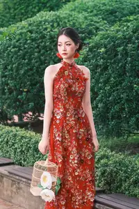 Graceful Asian Woman in Vibrant Red Floral Dress: Timeless Elegance by the Ancient Tree 1000024556-7