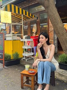 Natural Beauty: Serene Portrait of a Young Woman in Warm Sunlight-1