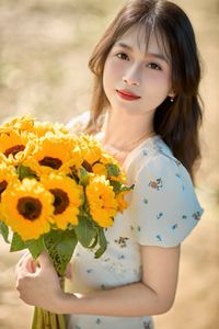 Charming Beauty with Sunflowers in a Natural Landscape-6