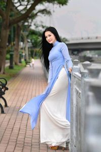 XVG No.4: Graceful Vietnamese Ao Dai Beauty by the River - Captivating Traditional Elegance-1