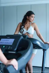 Model FE's captivating gym style in sleek white athletic wear | XiuRen No.10621-9