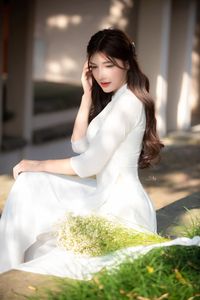 Graceful Vietnamese Girl in Pristine White Ao Dai: Timeless Beauty.-16