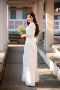 Graceful Vietnamese Girl in Pristine White Ao Dai: Timeless Beauty.-18