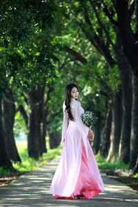VGU No.150: Graceful Vietnamese Beauty in Pink Ao Dai on a Serene Path-4