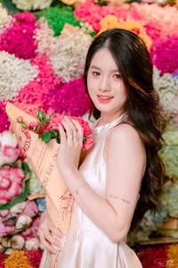 VGU No.133: Elegant Girl with a Radiant Smile Amidst a Colorful Floral Backdrop-7