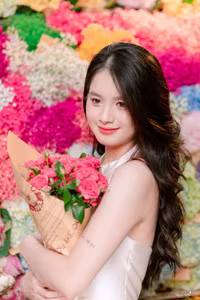 VGU No.133: Elegant Girl with a Radiant Smile Amidst a Colorful Floral Backdrop-0