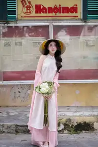 VGU No171: Vietnamese Beauty Graces a Flower Garden in Elegant Pink Ao Dai and Conical Hat-8