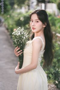 Graceful Girl in Light Yellow Dress with White Flowers, Ethereal Beauty in Nature-2