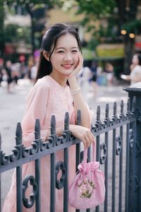 Elegant Woman in Pink Ao Dai at Hanoi Grand Cathedral - Vietnamese Cultural Charm-4