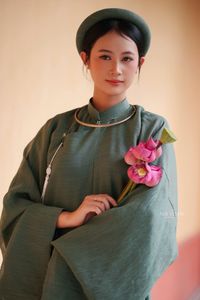 Traditional Vietnamese Soul: Elegant Lady in Ao Dai with Pink Lotus - 10000199719-0