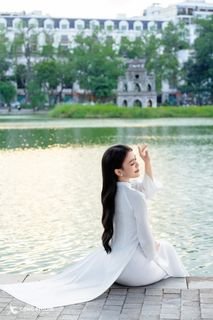 Gentle Vietnamese Woman in White Ao Dai by Hoan Kiem Lake | Serene Beauty of Vietnam-8