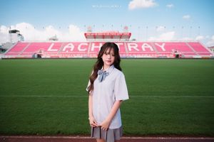 Young Schoolgirl in Uniform on Running Track - Fresh Youthful Beauty-1