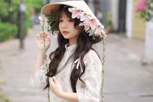 VGU No.143: Discover the Ethereal Beauty of a Vietnamese Girl in Ao Dai and Floral Conical Hat-10