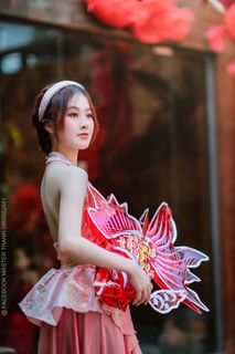 Elegant Vietnamese Beauty with Traditional Fish Lantern, Celebrating Culture-2
