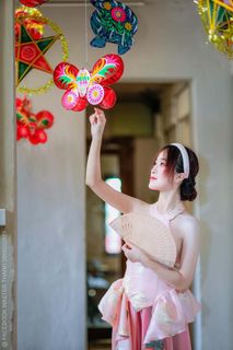 Elegant Vietnamese Beauty with Traditional Fish Lantern, Celebrating Culture-13