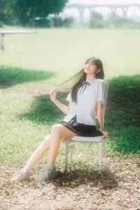 XVG No.42: Asian Girl's Serene Smile in School Uniform Amidst Lush Green Nature.-3