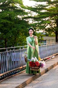 Traditional Vietnamese Beauty on Long Bien Bridge – Artistic Flower Baskets-2