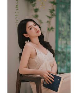 Relaxing Woman Reading in a Peaceful Natural Light Moment-0