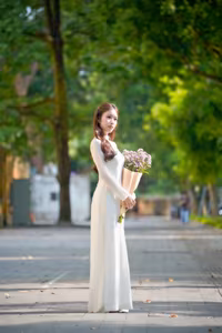 XVG No.55: Vietnamese Ao Dai Charm A Radiant Smile Embracing Youth and Tradition Under Golden Sun-1