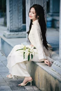 VGU No.131: Explore the Ethereal Beauty of a Vietnamese Lady in White Ao Dai with Lilies-18