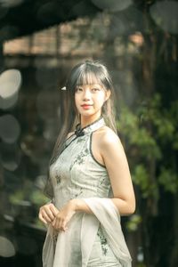 Elegant Vietnamese Girl on Ancient Wooden Bridge-4