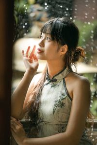 Elegant Vietnamese Girl on Ancient Wooden Bridge-1