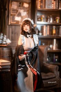 Coser Qiqi Nanako: Adorable Cow Maid Cosplay Captivates Fans-3