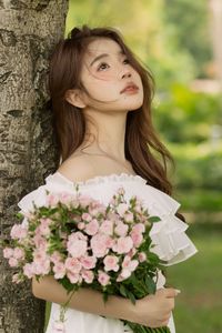 Gentle Beauty: Girl in Pristine White Dress with Pink Rose Bouquet Amidst Nature, Elegant Summer Style 1000019683-8