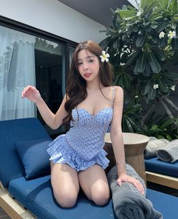 Tammy Pham radiant displaying alluring beauty by infinity pool-0