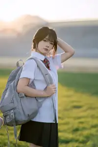Youthful Schoolgirl in Uniform: Serene Golden Hour Beauty, a Glimpse into Nostalgic Student Life.-2