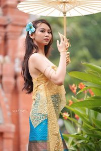 Traditional Vietnamese Beauty: Elegant Lady with Golden Lotus-9