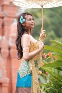 Traditional Vietnamese Beauty: Elegant Lady with Golden Lotus-2
