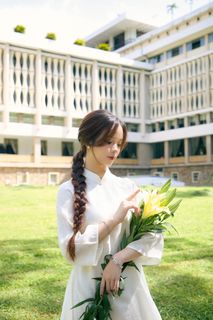 Youthful Vietnamese Girl in Pure White Silk Ao Dai with Yellow Lilies-3