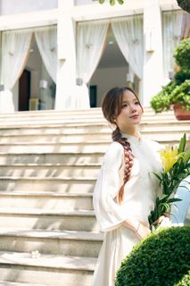 Youthful Vietnamese Girl in Pure White Silk Ao Dai with Yellow Lilies-2