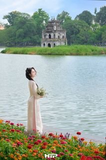 Gentle Beauty of Vietnamese Woman in Traditional Ao Dai at Hoan Kiem Lake-9