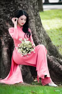 VGU No.18: Captivating Elegance A Young Woman in Pink Ao Dai-2